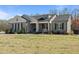 Charming single-story home with inviting front porch and manicured landscaping at 511 Mcarthur Rd, Broadway, NC 27505