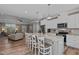 Modern kitchen with granite countertops, stainless steel appliances, and breakfast bar seating at 511 Mcarthur Rd, Broadway, NC 27505