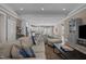 Open-concept living room flowing into kitchen and dining areas, perfect for entertaining at 511 Mcarthur Rd, Broadway, NC 27505
