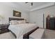 Comfortable main bedroom boasts a tray ceiling, neutral tones, and an en-suite bathroom at 511 Mcarthur Rd, Broadway, NC 27505
