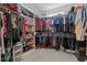 Spacious walk-in closet with built-in shelving and hanging rods offers plenty of storage space at 511 Mcarthur Rd, Broadway, NC 27505