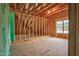 Unfinished attic showcasing exposed rafters and sheathing, providing a blank canvas for personalized design at 55 Glasgow, Rocky Mount, NC 27804