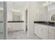 Bathroom featuring double sinks, granite countertops, and a mirror at 55 Glasgow, Rocky Mount, NC 27804