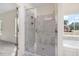 Bathroom with a marble tiled shower and glass enclosure with a built-in shelf at 55 Glasgow, Rocky Mount, NC 27804