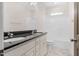 Bathroom featuring double sinks, granite countertops, and a shower-tub combination at 55 Glasgow, Rocky Mount, NC 27804