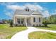 Charming single-story brick home with a welcoming front porch and well-manicured lawn on a sunny day at 55 Glasgow, Rocky Mount, NC 27804