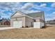 Brick home featuring an attached garage and well-manicured yard, offering curb appeal and functionality at 55 Glasgow, Rocky Mount, NC 27804