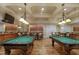 Recreation room with pool tables, decorative lighting, and ample space for entertainment and leisure at 55 Glasgow, Rocky Mount, NC 27804