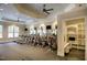This community gym features plenty of machines with mounted TVs for residents' enjoyment at 55 Glasgow, Rocky Mount, NC 27804