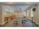 Bright gym featuring ample exercise equipment and a mirrored wall for training at 55 Glasgow, Rocky Mount, NC 27804