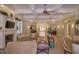 Spacious common room with a fireplace, sofas, and decorative ceiling, creating a cozy and inviting atmosphere at 55 Glasgow, Rocky Mount, NC 27804