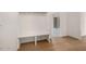 Welcoming mudroom with built-in bench, storage cubbies, and wood flooring at 55 Glasgow, Rocky Mount, NC 27804