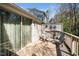 Relaxing deck with comfortable seating and charming butterfly decor creating a serene outdoor space at 5932 Whitebud Dr, Raleigh, NC 27609