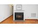 Elegant fireplace with tile hearth and mantel adding warmth and character to the living space at 5932 Whitebud Dr, Raleigh, NC 27609