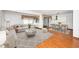 Inviting living room with a comfortable couch, modern decor, and an open layout that leads to the dining area at 5932 Whitebud Dr, Raleigh, NC 27609