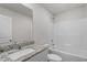 Bathroom featuring granite countertop vanity and a combined shower and bathtub at 65 Crow Field St, Roxboro, NC 27574