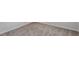 Installed wall-to-wall carpeting in neutral tone at 65 Crow Field St, Roxboro, NC 27574