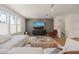 Modern living room featuring a decorative wall and an open-concept layout at 6926 Leesville Rd, Raleigh, NC 27613