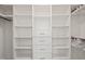 Walk-in closet with custom shelving, drawers, and hanging rods, perfect for organization at 6926 Leesville Rd, Raleigh, NC 27613