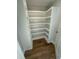 Walk-in pantry with floor-to-ceiling shelving for optimal storage, conveniently located near the kitchen at 6932 Buckhorn Duncan Rd, Holly Springs, NC 27540
