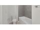 Tiled bathroom featuring a toilet, bathtub, and tiled shower at 75 Eltham, Rocky Mount, NC 27804