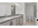 Bright bathroom with granite counters, double sinks, and tile flooring at 75 Eltham, Rocky Mount, NC 27804