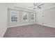 Bedroom featuring carpeting, a ceiling fan, and natural light from the windows at 75 Eltham, Rocky Mount, NC 27804
