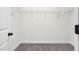 Walk-in closet with carpet flooring and wire shelving, offering ample storage space at 75 Eltham, Rocky Mount, NC 27804
