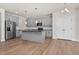 Open kitchen featuring an island, granite countertops, and stainless steel appliances at 75 Eltham, Rocky Mount, NC 27804