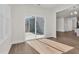 Bright living room showcasing hardwood floors and sliding door leading to a patio at 75 Eltham, Rocky Mount, NC 27804