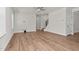 The open-concept living room has hardwood floors and a ceiling fan at 75 Eltham, Rocky Mount, NC 27804