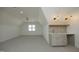 A versatile bonus room featuring a wet bar with tile backsplash and ample space for entertainment at 8005 Woodcross Way, Wake Forest, NC 27587