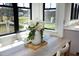 A beautiful view from breakfast nook window overlooking a pond and landscaped backyard is featured at 8005 Woodcross Way, Wake Forest, NC 27587