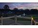 Picturesque pond view with fountain, captured from a deck or patio area at 8005 Woodcross Way, Wake Forest, NC 27587