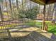 Wooden deck overlooking a wooded backyard, offering a serene outdoor space at 8008 Grey Oak Dr, Raleigh, NC 27615
