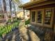 Outdoor wooden deck with double doors leading indoors, perfect for entertaining at 8008 Grey Oak Dr, Raleigh, NC 27615