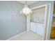 Conveniently located laundry area inside with washer, dryer, and storage space at 8008 Grey Oak Dr, Raleigh, NC 27615