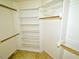 Spacious walk-in closet offering plenty of storage space and shelving at 8008 Grey Oak Dr, Raleigh, NC 27615