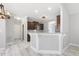 Open kitchen featuring dark cabinets, granite countertops, and a breakfast bar at 808 Cross Link Dr, Angier, NC 27501