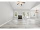 Spacious living room with a fireplace, modern flooring, and ample natural light at 808 Cross Link Dr, Angier, NC 27501