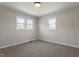 Neutral bedroom with freshly painted walls, carpet, recessed lighting and a window at 8215 S Nc 119 Hwy, Mebane, NC 27302