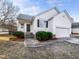 Charming single-Gathering home with a well-maintained lawn, attached garage, and inviting entrance at 101 Adams Peak Ln, Garner, NC 27529