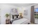 Cozy bedroom with a comfortable bed, soft lighting, and soothing decor for restful nights and relaxation at 1010 Red Roses Ave, Durham, NC 27703