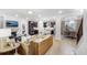 Open-concept living space with hardwood floors, a fireplace, and seamlessly connected kitchen and dining areas at 1010 Red Roses Ave, Durham, NC 27703