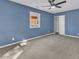 Bedroom featuring plush carpeting and natural light at 1017 E Club Blvd, Durham, NC 27704