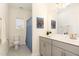 Bright bathroom featuring vanity, toilet, shower/bath combination, and stylish decor at 1040 Lippincott Rd, Durham, NC 27703