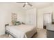 Comfortable bedroom with ceiling fan, double closets and serene decor at 1040 Lippincott Rd, Durham, NC 27703