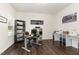 Bright home office with modern desk, shelving and sewing machines for crafting and productivity at 1040 Lippincott Rd, Durham, NC 27703