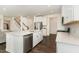 Spacious kitchen with an island, stainless steel appliances, and open layout to the living areas at 1040 Lippincott Rd, Durham, NC 27703