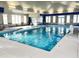 A well-lit indoor community pool, perfect for year-round enjoyment and relaxation at 1040 Lippincott Rd, Durham, NC 27703